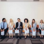 Photo of candidates waiting for a job interview. Selective focus