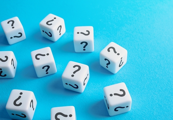 Image of Scattered dice with question marks